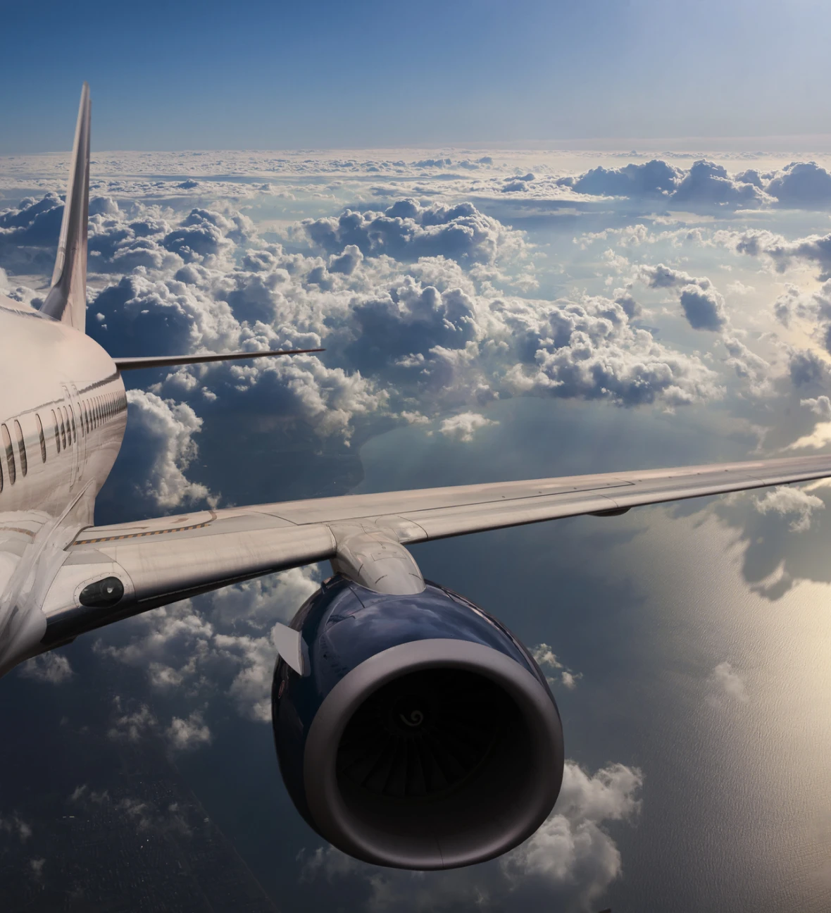 Airplane flying above the clouds